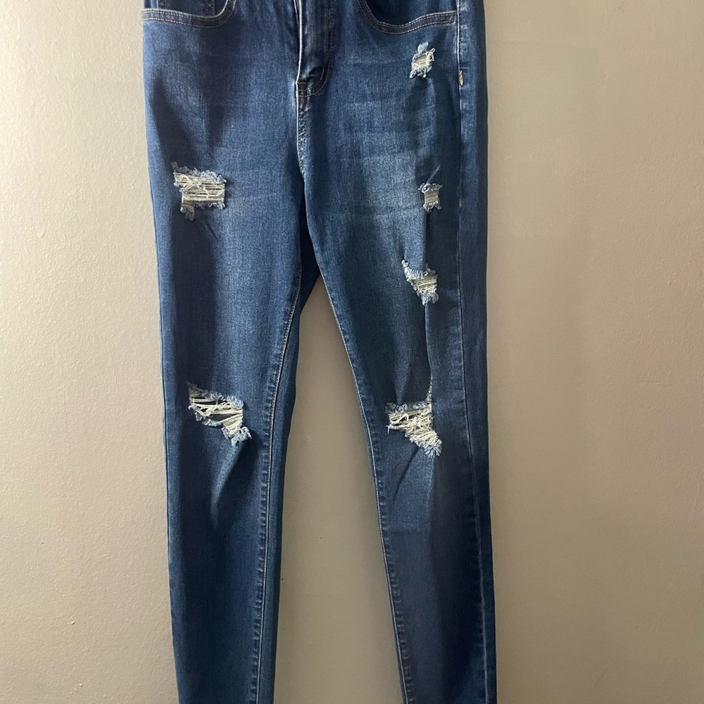 Distressed Blue Jeans